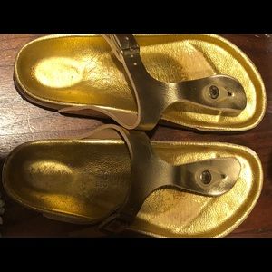 Birkenstock’s gold gizeh size 36 limited edition.
